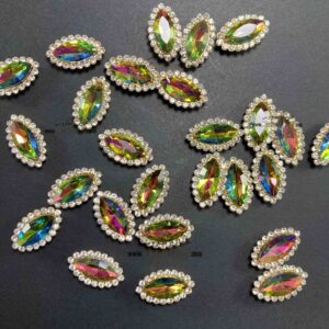 سنگ چشمی دور نگین 7 در 15 ( پر طاووسی )