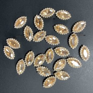 سنگ چشمی دور نگین 7 در 15 ( شامپاینی )